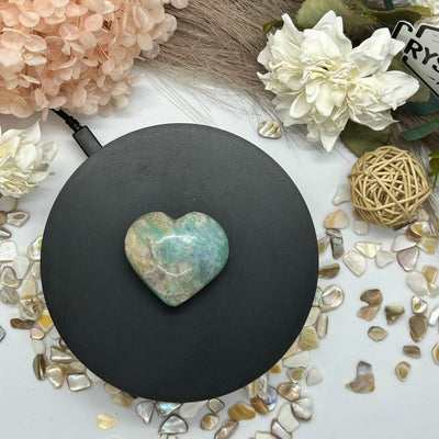 Kyanite Heart Carving ,Add some heart to your crystal collection with our Kyanite Heart! This unique carving showcases the stunning properties of kyanite in a playful and quirky design. Perfect for bringing good vibes and positive energy into any space.
